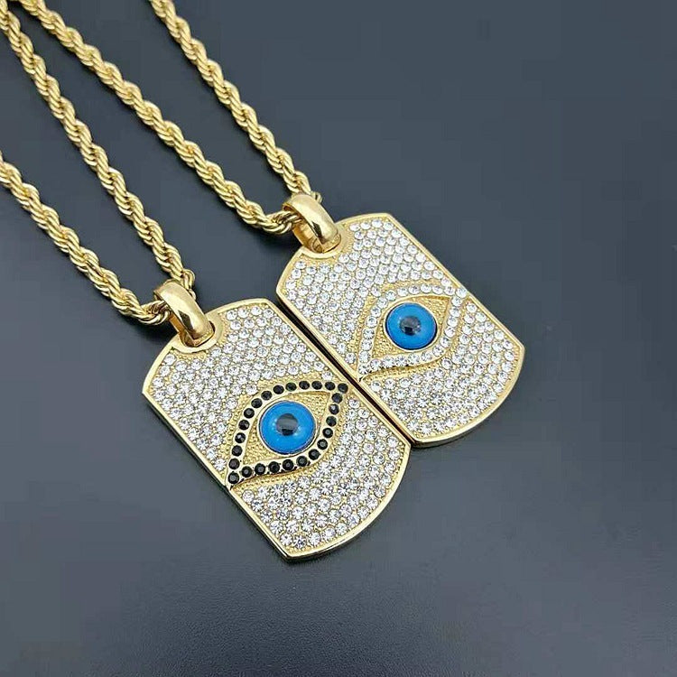 18k Gold-Plated Evil Eye Dog Tag Pendant Necklace with Stainless Steel Chain by Ancient Infusions – Bold and Protective Jewelry.