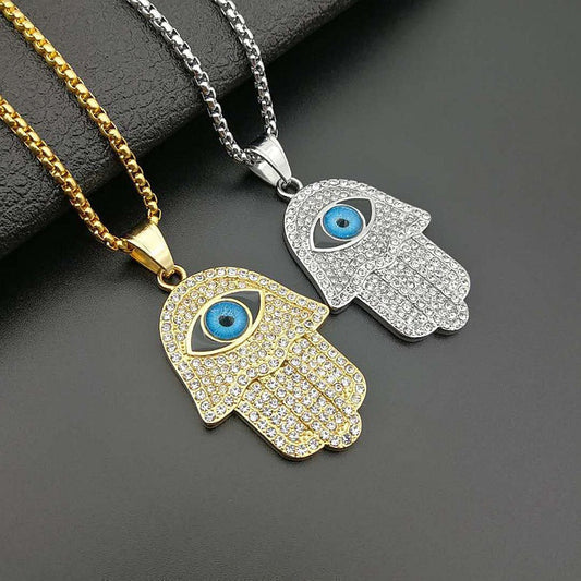 18k Gold-Plated Hamsa with Evil Eye Necklace Featuring Cuban Zircons and Stainless Steel Chain by Ancient Infusions.