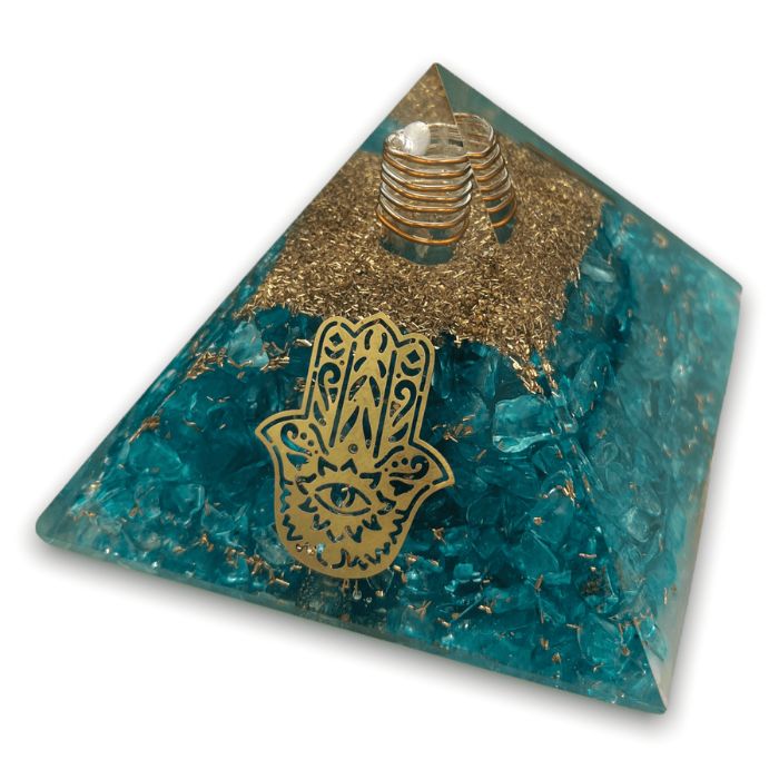 Immerse in serenity - Angled perspective of the Aquamarine Orgonite Pyramid by Ancient Infusions. The calming properties of aquamarine and orgonite technology harmonize energies for enhanced well-being.