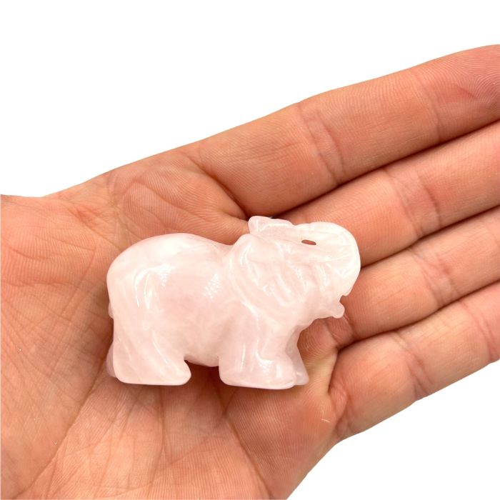 Ancient Infusions Rose Quartz Crystal Carved Elephant - A symbol of love and compassion in the gentle pink hues of rose quartz.