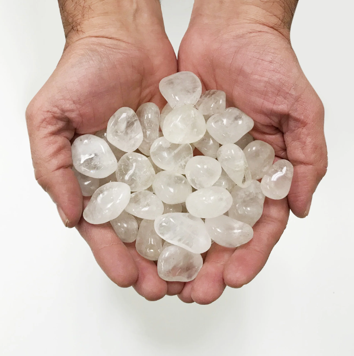 Clear quartz tumbled stones for sale, emphasizing their radiant energy and versatile spiritual properties.