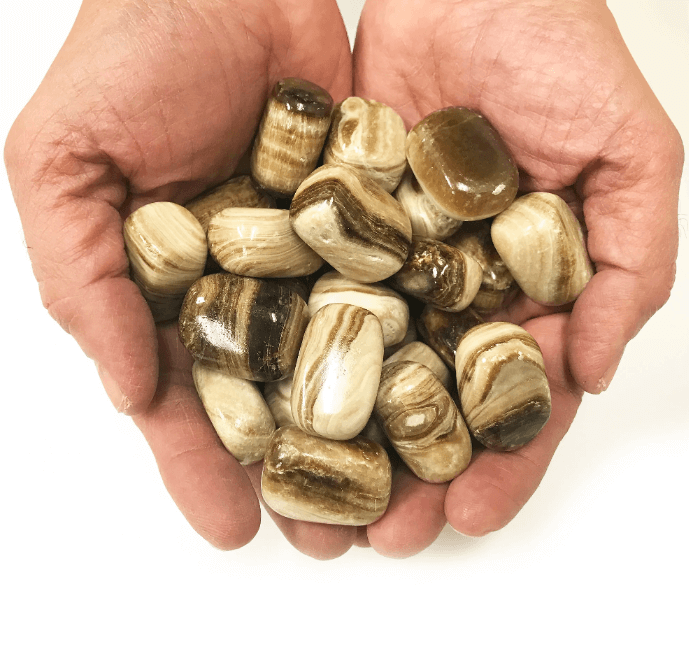 Close-up of Brown Calcite stones, highlighting their metaphysical properties and chakra benefits.