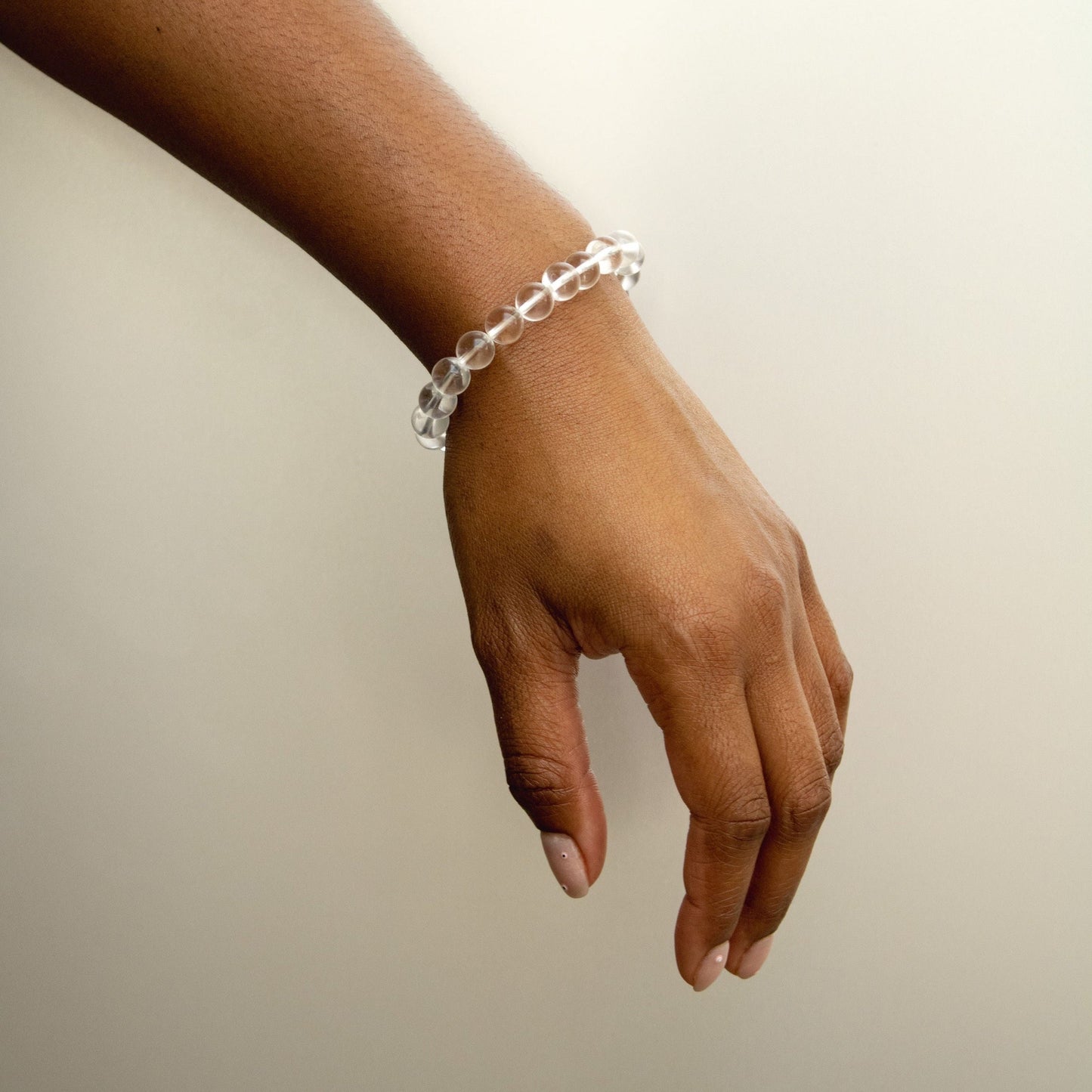 Clear Quartz Bracelet Worn on Hand – Benefits and Meaningful Healing Crystal Jewelry.