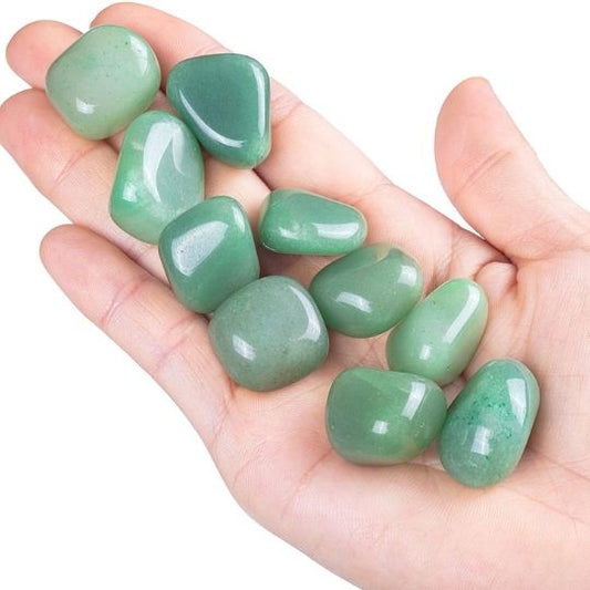 Natural Green Aventurine tumbled stones showcasing their vibrant hues and healing benefits