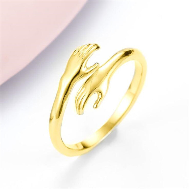 Men’s Adjustable Hugging Hands Ring in Alloy – Stylish and Meaningful Jewelry Piece.