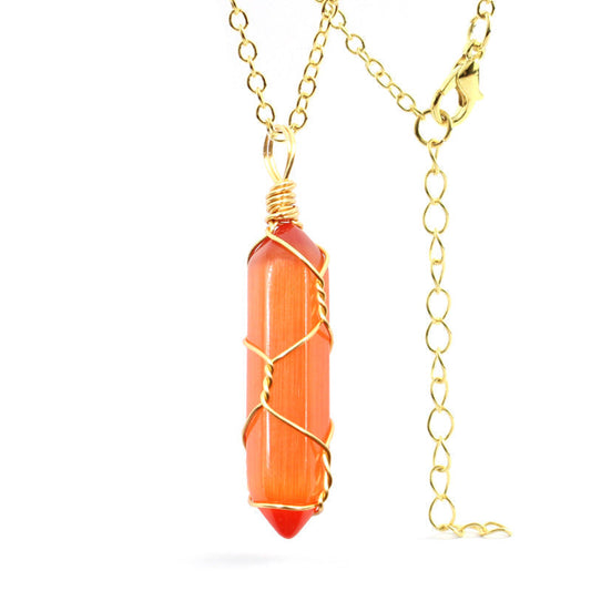 Close-up of an Orange Cat's Eye Necklace featuring a glowing gemstone wrapped in handcrafted gold wire with a stainless steel chain.