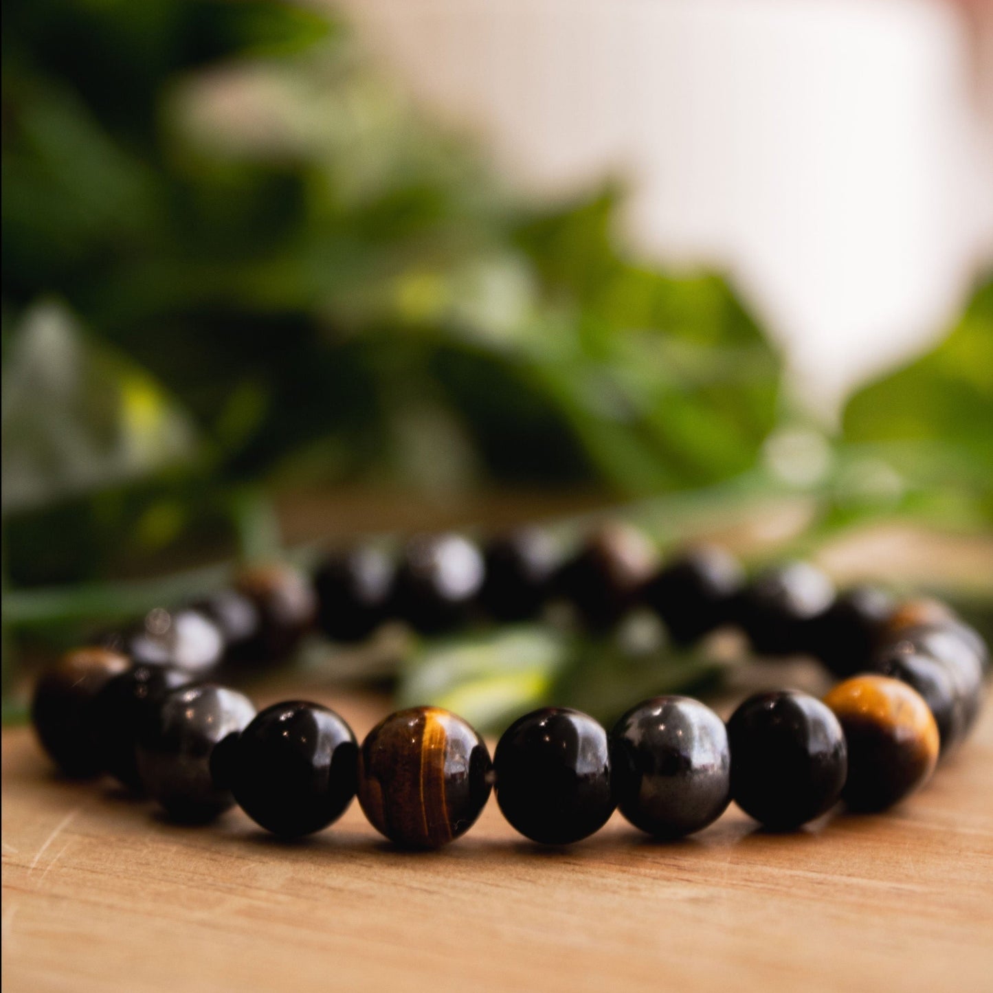 Triple Protection Crystal Bracelet with Black Obsidian, Tiger’s Eye, and Hematite Beads.