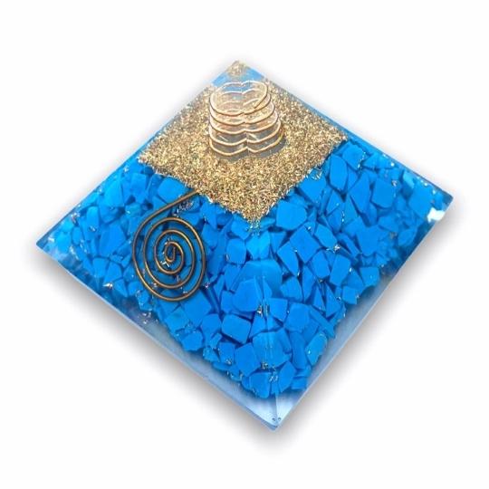Turquoise Orgonite Pyramid by Ancient Infusions - Experience a sense of calm and enhanced protection with this radiant fusion.